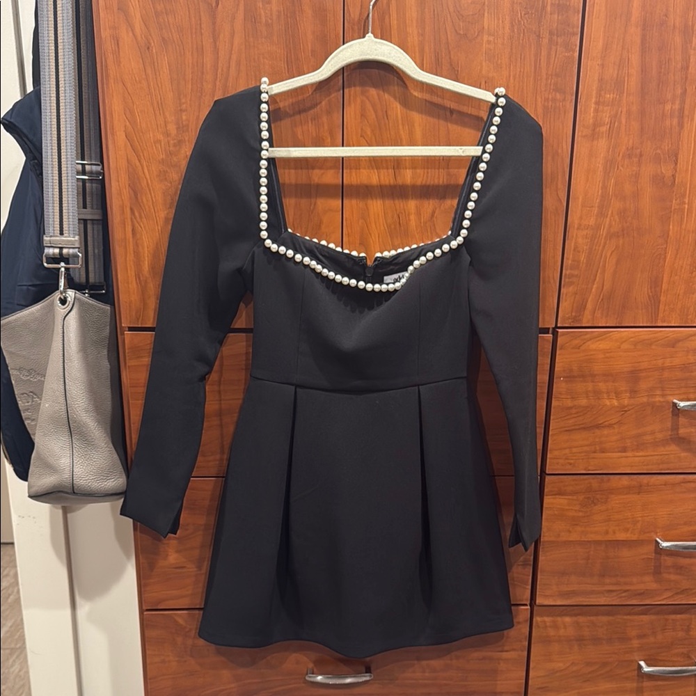 Elegant Black Dress with Pearl Accents